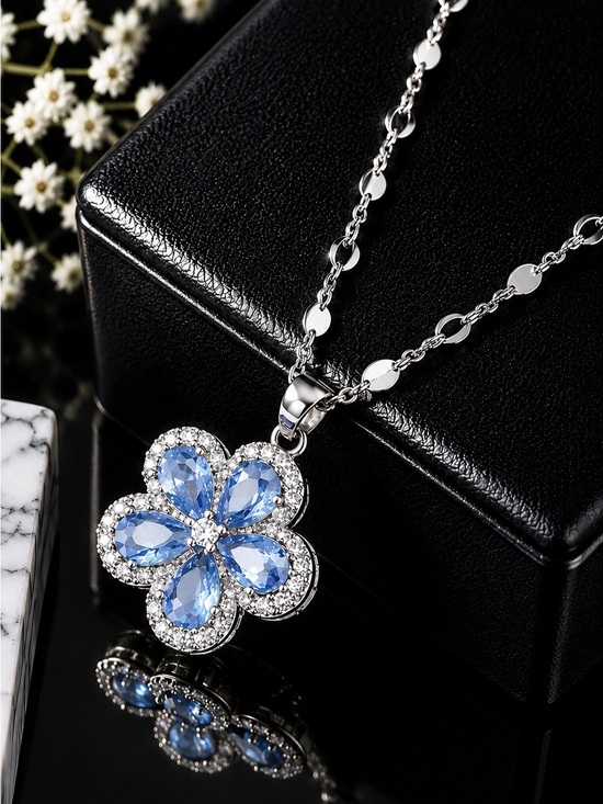 Anthropologie Jewelry - Silver Necklace with Blue Floral Pendant